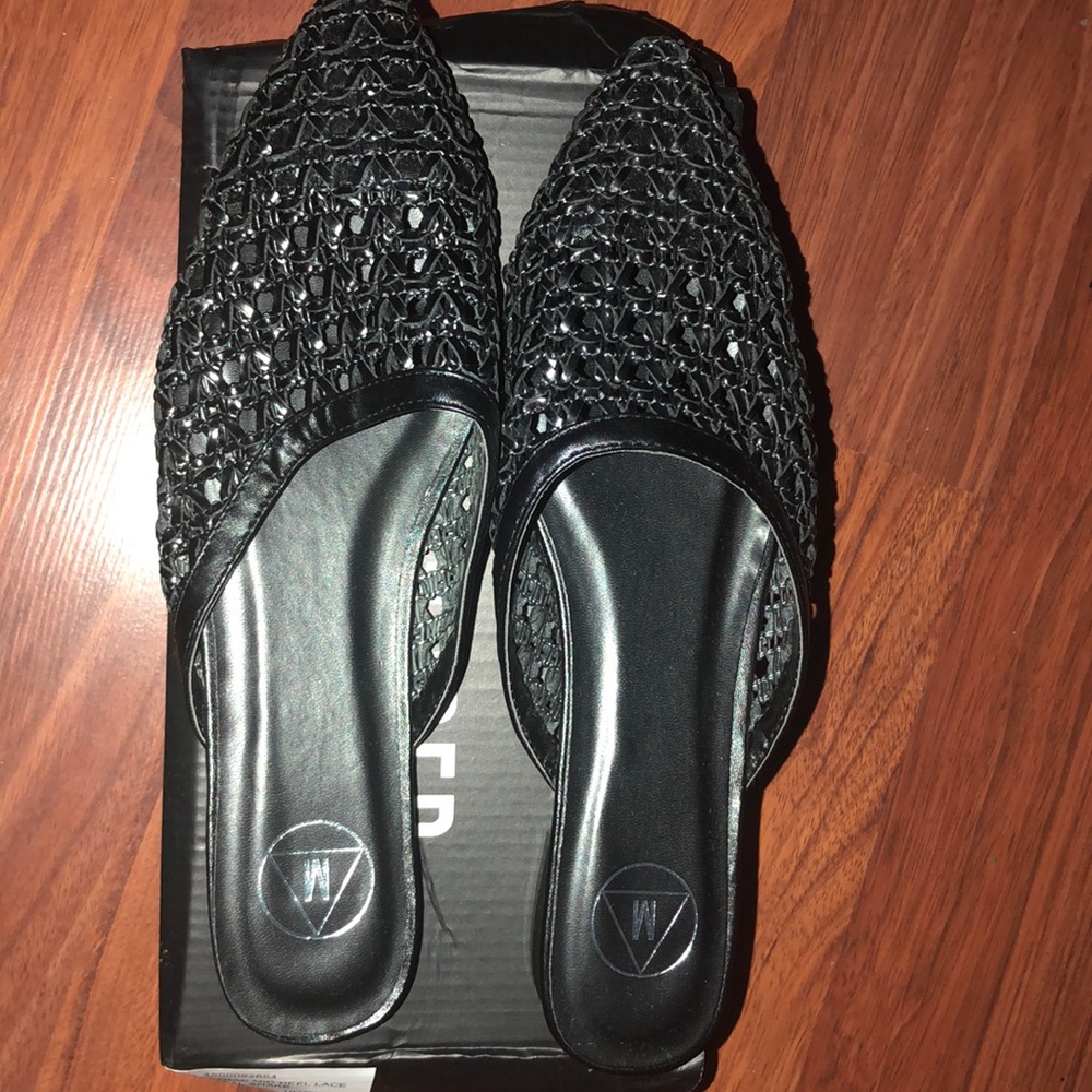 Black woven mule sandals